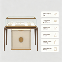 Vitrine à bijoux rectangulaire en verre de luxe sur mesure, cadre or champagne, éclairage LED, double porte, armoire de rangement, pieds en bois
