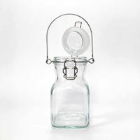 Bouteille en verre portable à couvercle basculant avec poignée, échelle gravée, pot en verre hermétique de qualité alimentaire pour le stockage du miel, de la confiture et des sauces