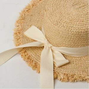 W645 Sombrero de paja plano de primavera y verano para niños, nuevo estilo con borde cepillado, lazo de rafia, sombrero de Sol de moda para viajes al aire libre - Product Image 4