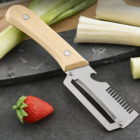 Multifunctionele roestvrijstalen uien- en groentesnijder & -schiller, handmatige keukenschiller, fruit- en suikerriettool met houten handvat