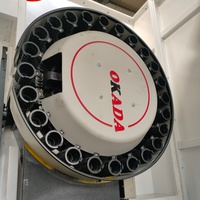 Machine-outil CNC à double tourneur DZ-4600V, adaptée au fraisage et au perçage simultanés des extrémités des pièces d'arbres et autres.