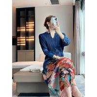 Robe mi-longue à simple boutonnage pour femmes plissée Robe Abaya décontractée ample à col en V de haute qualité Dernières Abaya de style ethnique