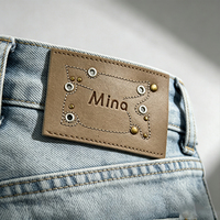 Étiquettes personnalisées en cuir véritable avec logo en relief pour jeans, étiquettes de vêtements à coudre, accessoires vestimentaires, vente en gros OEM