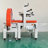 Machine d'emballage automatique de ruban adhésif pour l'emballage de cartons d'expédition e-commerce en usine, machine de cerclage et de scellage