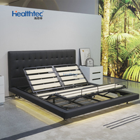 Cadre de lit flottant minimaliste en bois, taille King/Queen, avec tête de lit rembourrée noire