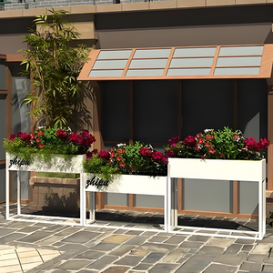 Boîtes à fleurs en acier inoxydable colorées et personnalisables, idéales pour des designs peu encombrants dans les patios et les petits jardins. - Product Image 3