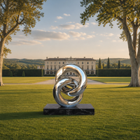 Sculpture en acier inoxydable poli miroir, anneau entrelacé, grand nœud, statue d'art métallique pour l'intérieur moderne des bâtiments commerciaux
