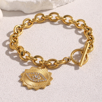 Bracelet Dreamidea en acier inoxydable plaqué or 18 carats avec breloque œil et fermoir à bascule – Bijou tendance et protecteur