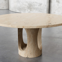 Table de salle à manger ronde en marbre avec base découpée en ellipse, sculptée à la main en pierre massive, pour un intérieur de maison haut de gamme