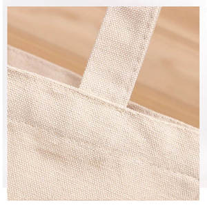 Environmentally friendly and reusable designer <b>fabric</b> canvas cotton shopping <b>bag</b> with custom logo printed on it - Product Image 2