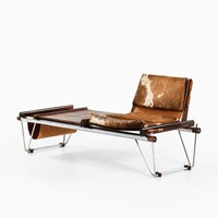 Chaise longue de style mid-century moderne avec structure en métal chromé et revêtement en cuir de vachette, inclinable