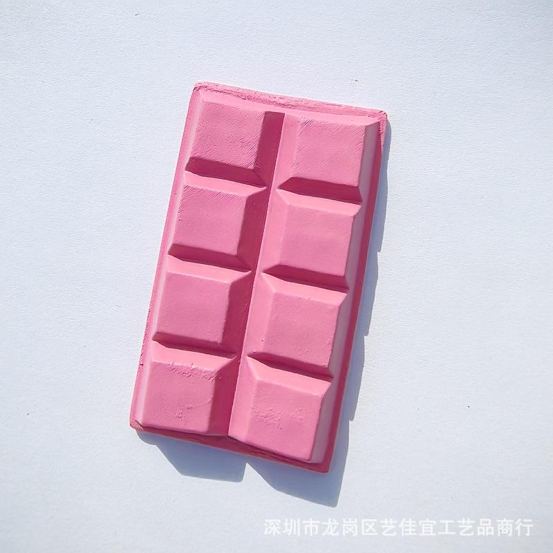 El bloque de chocolate en polvo mide 3,4*5,9 cm