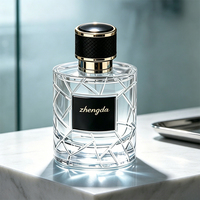 Flacon de parfum en verre cylindrique élégant de 100 ml, luxueux, écologique, anti-fuite, avec vaporisateur à pompe, logo personnalisé imprimé, coffret cadeau exquis