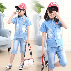 Ropa Infantil Alemana al por Mayor: Pantalones Cortos de Uniforme Escolar Color Caqui y Camisetas Estampadas en Stock - Product Image 6