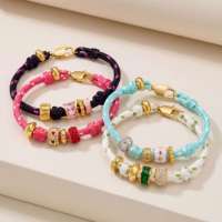Bracelet tressé rose tendance EDGE avec breloque cœur plaqué or et perles en strass rouges, bijoux fantaisie pour femme