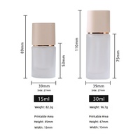 Botol Lotion Kaca Silinder Kosong 15ml 30ml dengan Pompa, Sablon, dan Lapisan Frosted untuk Wadah Kosmetik Perawatan Kulit, Grosir Guangzhou