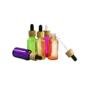 Đầy màu sắc thiết kế độc đáo rỗng 30ml vuông tinh dầu thủy tinh nhỏ giọt chai với Pipette tre cổ áo