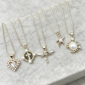 สร้อยคอทองชุบ 18K ดีไซน์สวยงาม ประดับมุก รูปหัวใจ ไม้กางเขน แมลงปอ ปลาดาว สำหรับผู้หญิง เครื่องประดับแฟชั่น ขายส่ง - Product Image 4