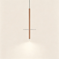 Lustre LED cylindrique minimaliste en acier inoxydable OEM, lampe de plafond multi-brins pour l'éclairage des projets hôteliers, chambres d'hôtes et villas