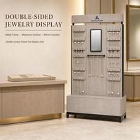 Vitrine de présentation de bijoux double face avec cadre métallique, structure en bois et surface mélaminée, miroir, présentoir de vente au détail