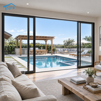 Porte coulissante noire imperméable NF moderne pour villas cloison finie avec ouverture manuelle élégante et élégante