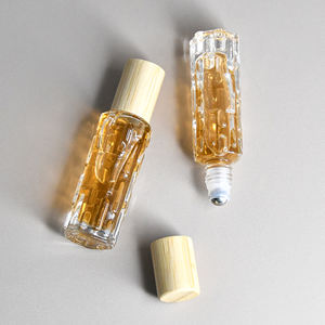 Bouteille à roulement à billes portable vide 10ml 15ml Bouteille d'huile essentielle unique avec surélevé sur la surface avec un couvercle en bois - Product Image 2
