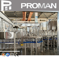 Machine automatique de remplissage et d'embouteillage de bouteilles d'eau minérale Pure