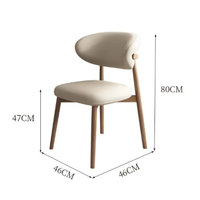 Chaises de salle à manger en métal minimalistes italiennes en gros, revêtement en cuir noir, coussin moelleux pour la maison, les restaurants et les cafés