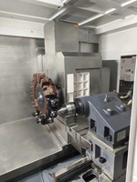 Torno CNC de Cama Inclinada de 5 Ejes y Doble Husillo de Servicio Medio Automático LC-52DYF con Control Fanuc/GSK y 12 Estaciones de Herramientas
