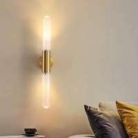 Lampe murale moderne simple de luxe léger, décorative, personnalisée, en fer et verre, à tube long, pour couloir d'hôtel, chambre à coucher, chevet, canapé