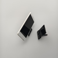 Support d'affichage pour smartphone en acrylique noir, support de téléphone portable pour comptoir avec support arrière pour les magasins de détail, les expositions et les bureaux