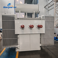 Transformador trifásico de media y alta tensión Haoyue, inmerso en aceite, 30KVA-2500KVA, ROHS, totalmente sellado para edificios