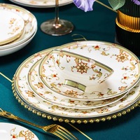 Service de table en porcelaine fine à bord doré, motif floral européen, avec sucrier en forme de cygne, pour mariage et hôtel