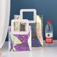 Vente en gros de sacs à provisions transparents imperméables avec logo personnalisé de haute qualité sac fourre-tout transparent avec poignées sac en PVC