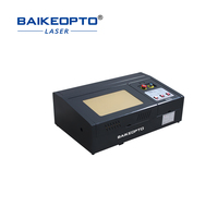 Machine de gravure laser CO2 de table électrique 3020 40W refroidie par eau haute précision AI/DXF/DST pour bois/papier/PVC/cristal/roche