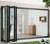 Porte coulissante pliante moderne à cadre fin en aluminium et verre trempé, design suspendu pliable pour l'extérieur, hôtels, villas