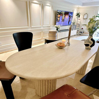 Meubles en pierre design moderne Décoration intérieure table ovale en pierre naturelle beige table à manger en marbre travertin à base cannelée