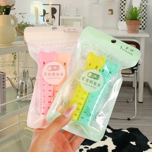 Pinzas para rizar el cabello de nailon Yuhuan, colores surtidos, dos por paquete, sin calor, de resina plástica, para rizar. - Product Image 1