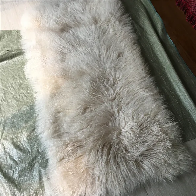 Longs cheveux bouclés tibétain en peau de mouton laine 100% véritable luxe véritable oreiller en fourrure de Mongolie