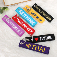 Porte-clés de voiture de luxe de qualité supérieure, personnalisable avec logo, porte-clés d'avion, cadeau suspendu, porte-clés brodé pour vêtements, fabrication en usine à prix avantageux