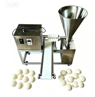 Machine automatique de production et de transformation de boules de pâte spirales et de snacks fourrés pour boulangerie