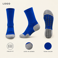 Chaussettes renforcées antidérapantes Field Grip Secure Fit avec talon amorti, bleu roi, pour le football, profil fin, avec tableau de tailles pour crampons.
