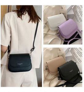 I-0595 Bolsos de Cuero PU al por Mayor de Fábrica, Bolso de Mano de Diseñador con Cierre de Cremallera y Botón, Precio Económico, Bolso de Hombro de Color Puro - Product Image 6