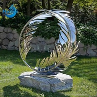 Sculpture d'ailes d'ange abstraites en métal poli moderne, décoration de paysage extérieur d'hôtel personnalisée