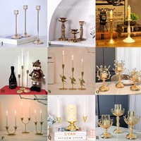 Venta al por mayor de 3/6 piezas de candelabros de hierro con base chapada, adornos para el hogar, centros de mesa, portavelas dorados para velas cónicas