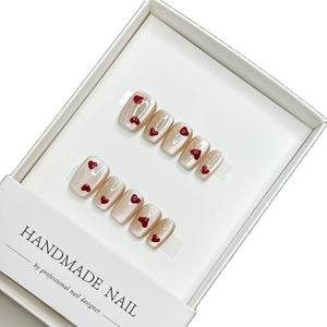 Prezzo di fabbrica fatto a mano <span class=keywords><strong>unghie</strong></span> <span class=keywords><strong>finte</strong></span> Private Label premere su <span class=keywords><strong>unghie</strong></span> corte Orval copertura completa <span class=keywords><strong>unghie</strong></span> <span class=keywords><strong>finte</strong></span> <span class=keywords><strong>con</strong></span> cuori rossi per le ragazze - Product Image 1