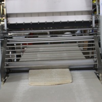 Machine automatique de laminage de pâte feuilletée avec pulvérisation de farine pour la production en boulangerie