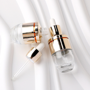 Luxury Golden Dropper <b>Bottle</b> Essential Oil <b>Bottle</b> Glass <b>Bottle</b> Customized Cosmetics Container <b>Empty</b> with Pressing Pump Head - Product Image 2