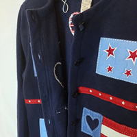 Vente en gros de tricots personnalisés Pull cardigan patchwork en laine polaire classique sur le thème des États-Unis avec tissu polaire