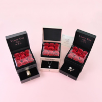2025 boîte d'emballage de bouquet de fleurs boîte-cadeau de fleur en carton de conception de valise avec boîte-cadeau de fleur en gros